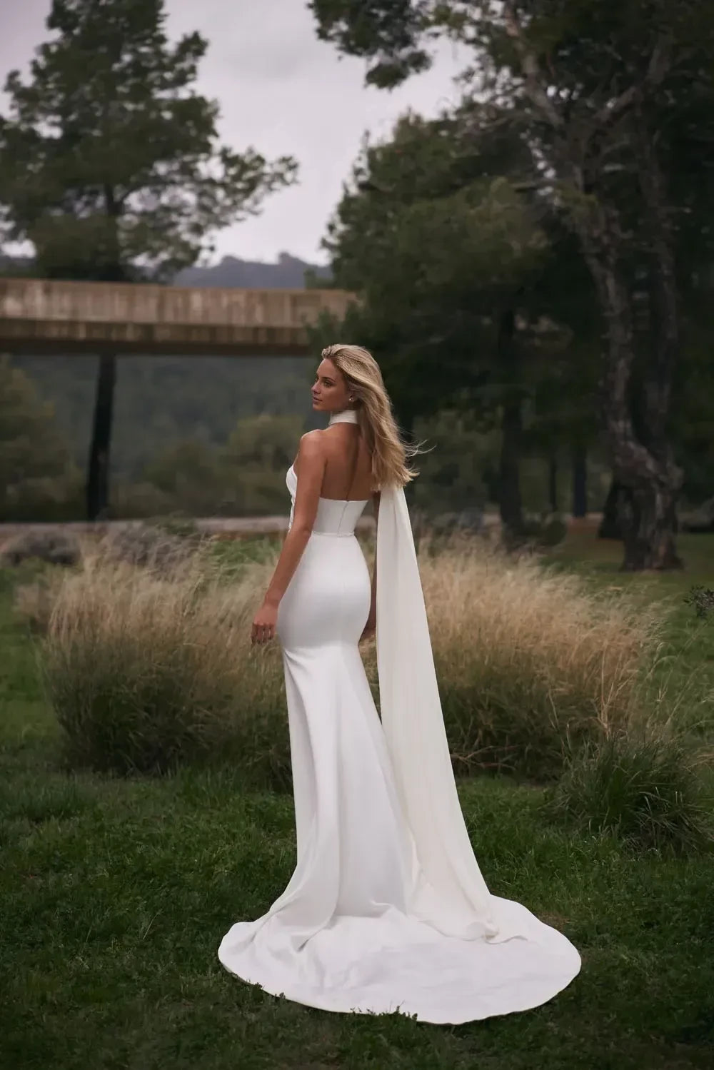 Daring One Shoulder Mermaid Rhinestone Accent Open Back Train Length Wedding Dress